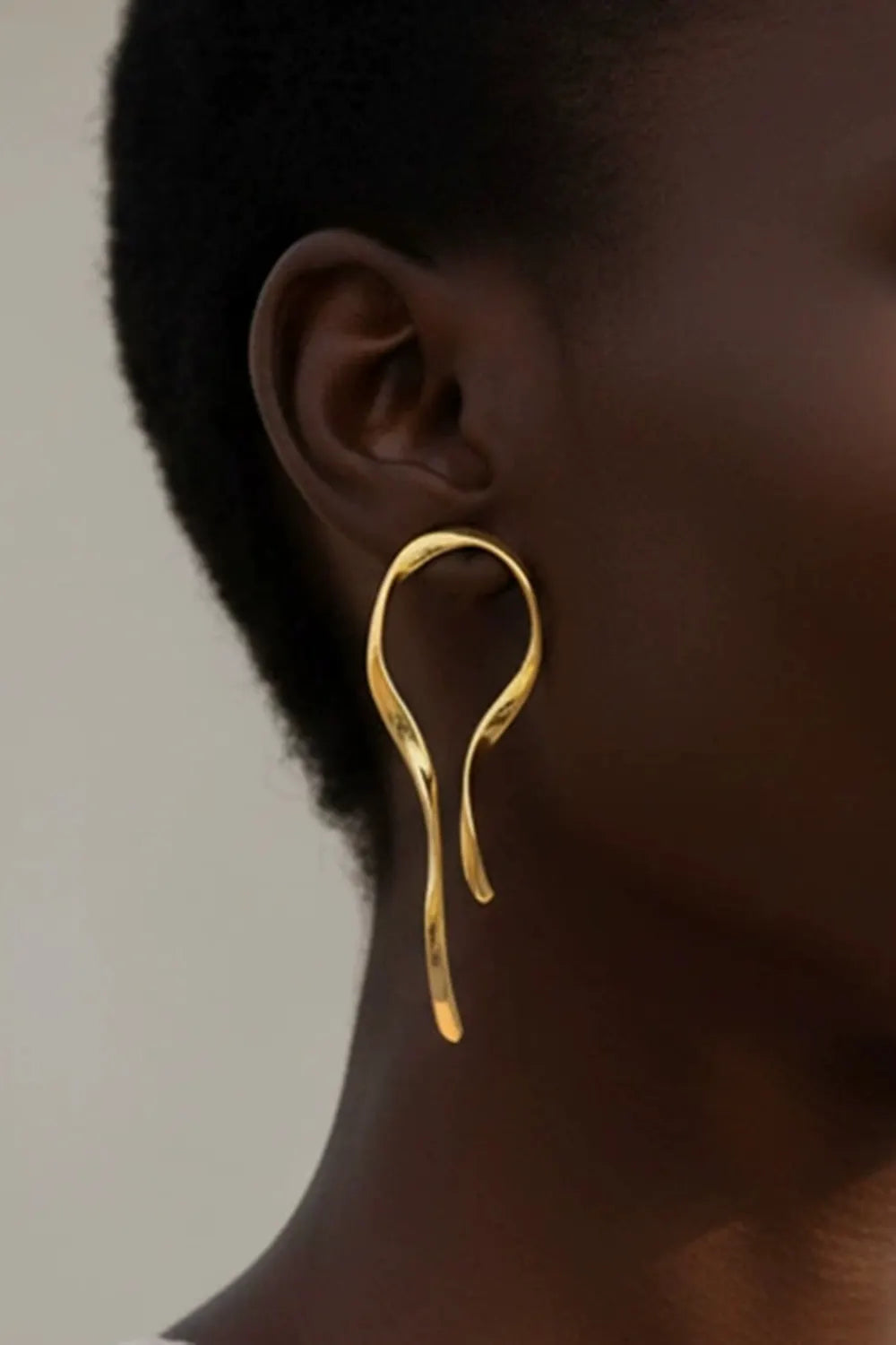 Abstract Fluid Shape Gold Tone Asymmetric Long Drop Earrings